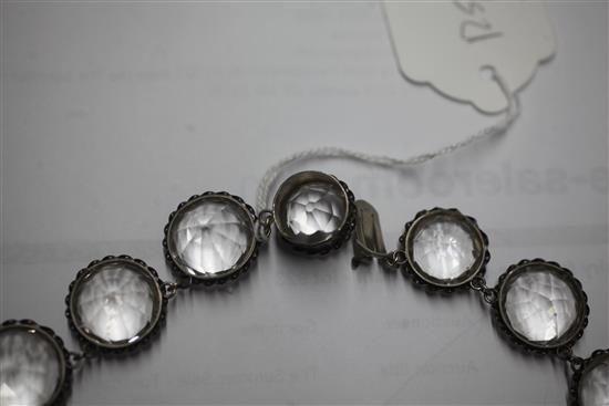 A mid to late 19th century white metal and rock crystal drop necklace and pair of matching earrings, 40cm.